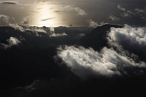 Mountains with clouds by Pacific ocean on Maui, Hawaii