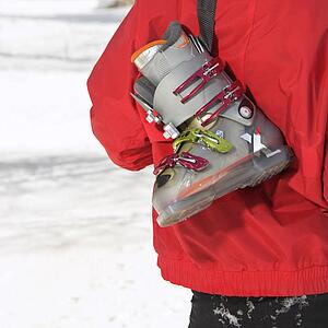 Ski boot over the shoulder