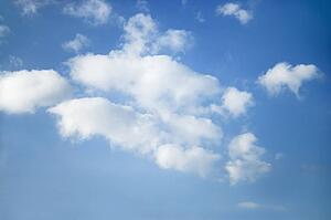 Cumulus clouds in blue sky