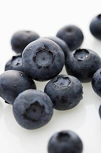 Group of blueberries on white background.