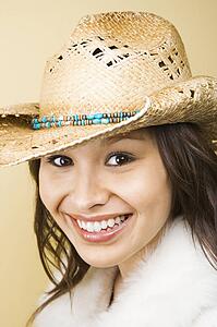 Woman wearing cowboy hat