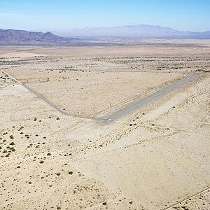 Aerial view of remote landing strip in California desert.