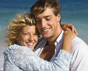 Couple embracing on beach