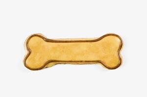Sugar cookie in shape of dog bone with decorative icing.