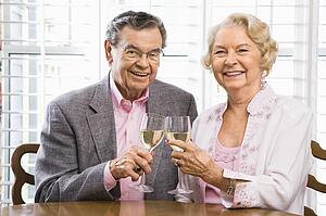 Couple toasting wine glasses