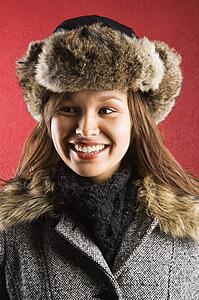 Woman wearing fur hat 