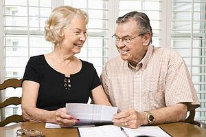 Couple looking at their bills