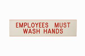 Employees must wash hands sign against white background.