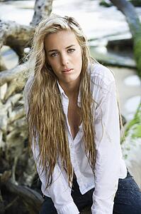 Pretty woman posing on Maui, Hawaii beach