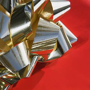 Detail of a gold bow.