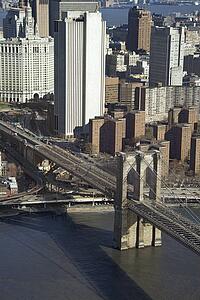 Aerial view of Brooklyn Bridge with Chinatown and New York City buildings