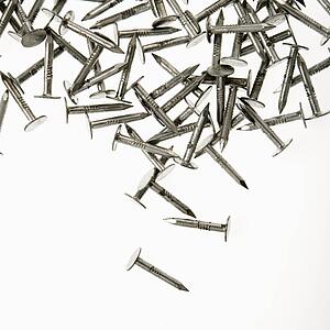 Pile of nails against white background