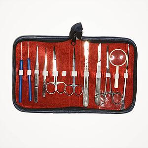 Medical kit with tweezers, scissors, scapel.