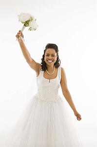 Portrait of a mid-adult bride on white background