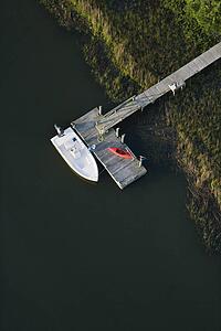 Dock with motorboat and kayak.