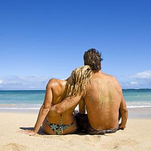Couple sitting on beach