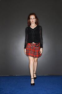 Pretty young woman walking towards viewer