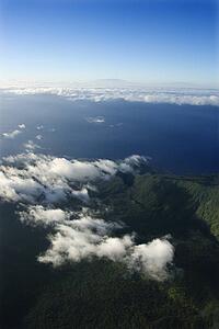 Aerial view of mountain landscape with clouds on Maui, Hawaii.
