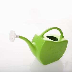Green plastic watering can. 