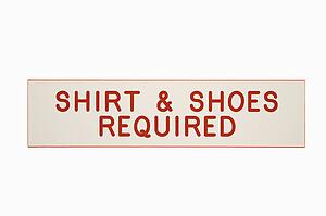 Shirt and shoes required sign.