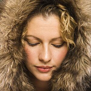 Woman wearing fur hood 