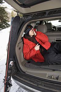 Sleeping in back of SUV with ski gear