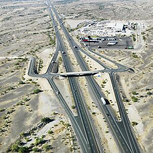 Aerial view of interstate 10 in southwest desert landscape of Arizona.