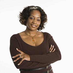 Portrait of pretty woman standing against white background