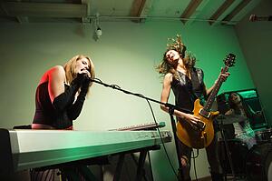 Girl band playing instruments