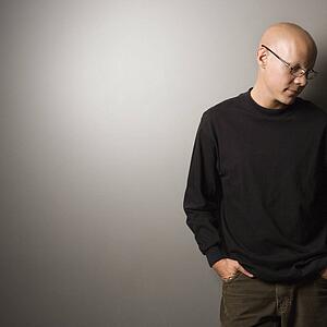 Portrait of man with hands in his pockets