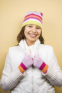 Woman wearing winter hat and gloves 