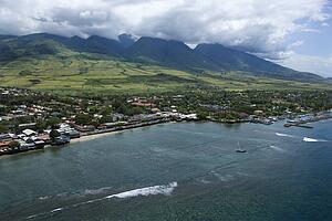 Aerial view of waterfront buildings on coastline of Maui, Hawaii