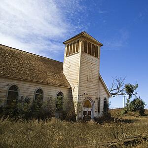 Old abandoned white wooden church in Maui, Hawaii.