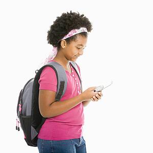Girl with text messaging on cell 