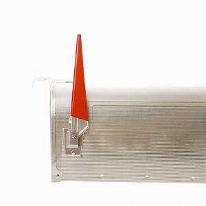 Shiny silver metal mailbox with flag up