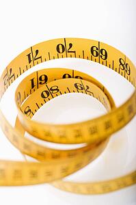 Measuring tape in a pile