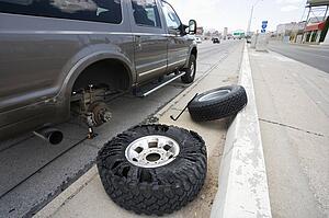 Vehicle broken down with damaged tires 