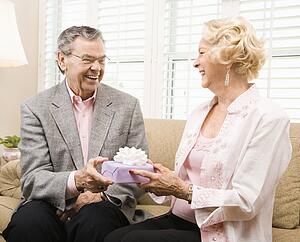 Couple exchanging present