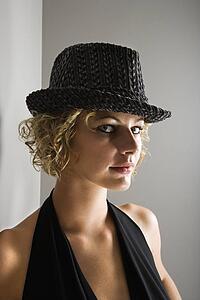 Woman wearing fedora hat 