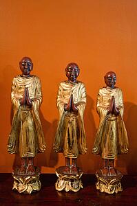 Three wooden statues of Buddhist 