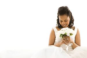 Mid-adult bride on white background