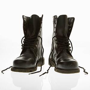 Black leather high top boots with untied laces