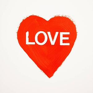 Red heart shape with text love.