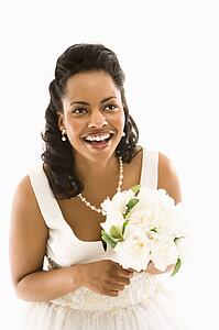 Portrait of a bride holding bouquet