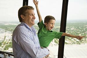 Father and son at observation deck at Tower of the Americas in San Antonio, Texas