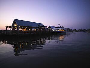 Ferry boat at dock at dusk at Bald Head Island, North Carolina