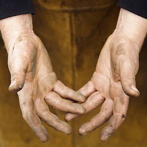 Dirty male metal smith's hands