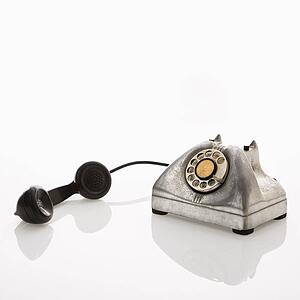Rotary telephone with receiver to the side