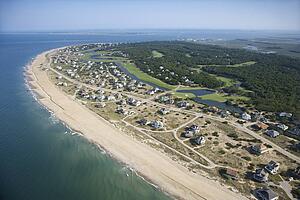 Aerial view of beach and residential neighborhood at Bald Head Island, North Carolina
