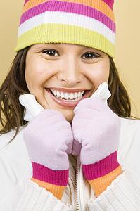 Woman wearing winter hat and gloves 